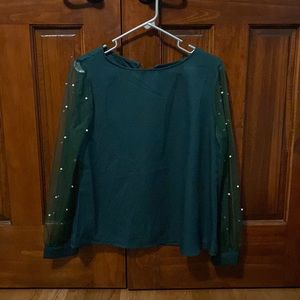Green top with mesh sleeves and pearls